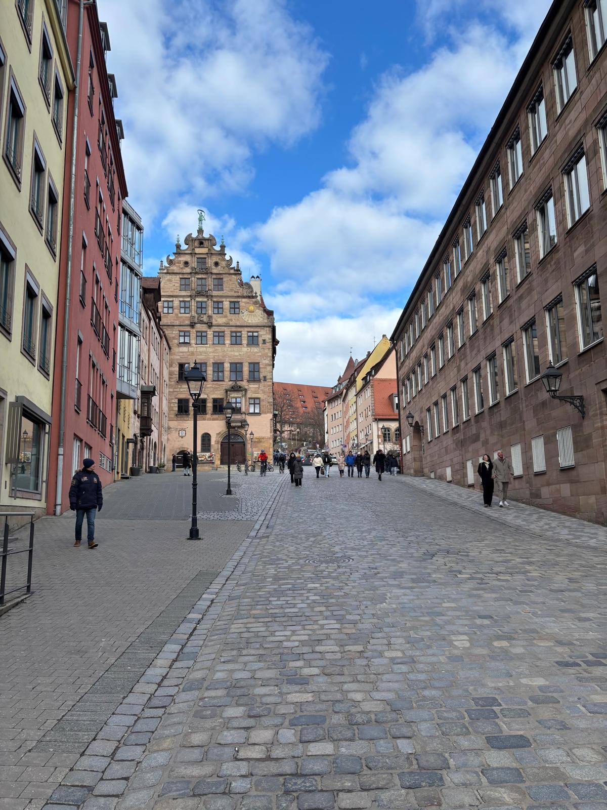 A cobbled street in Nuremberg's old town with historic gabled buildings
